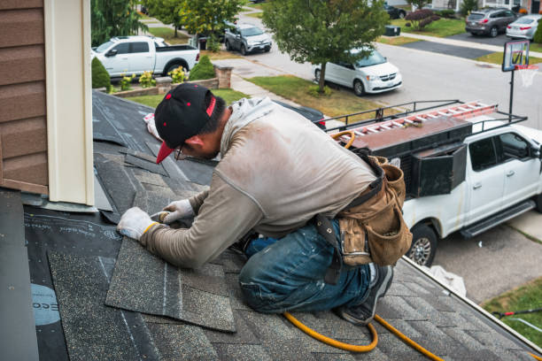 Professional Roofing technician working in Albany, OR